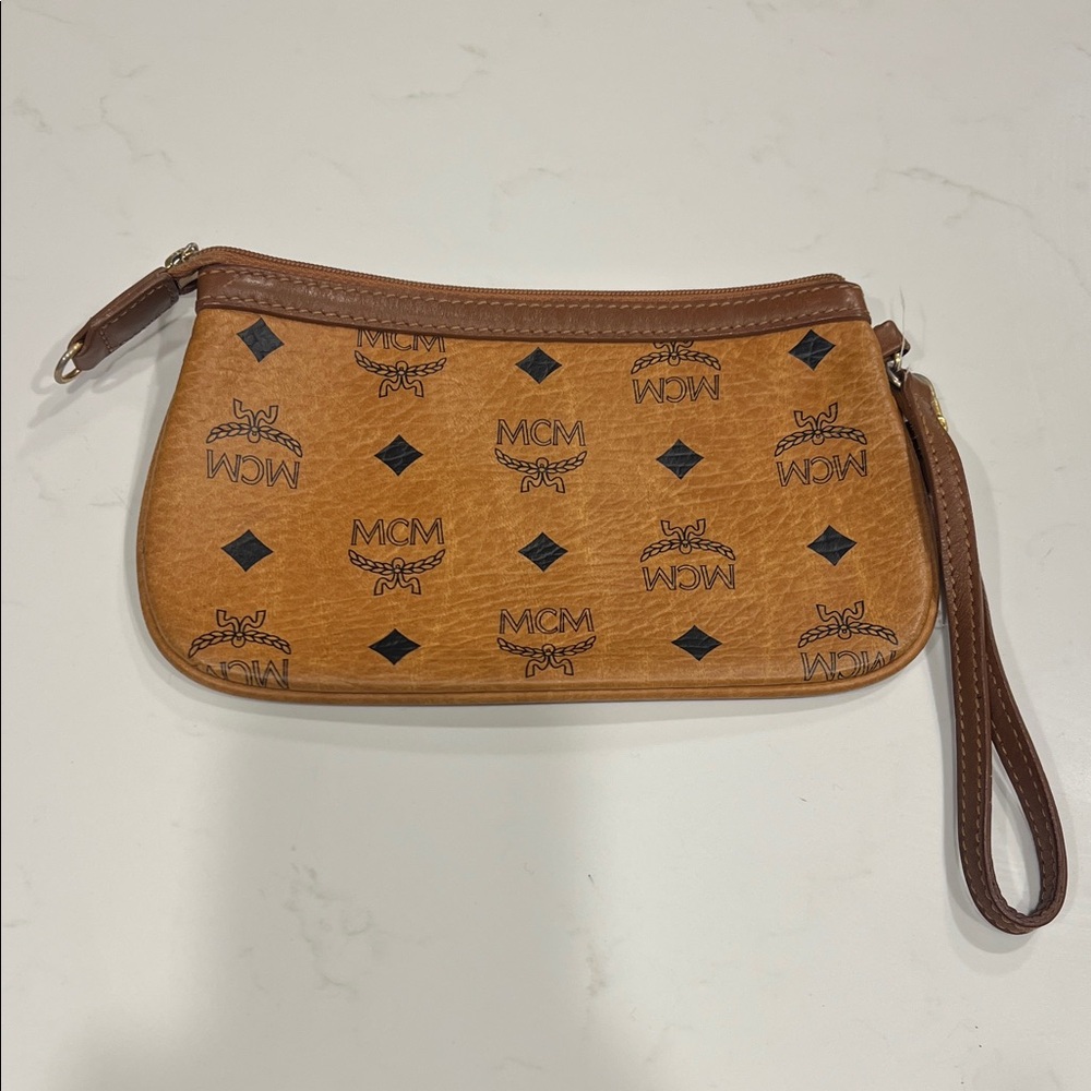 MCM Tan Wristlet with Black Logo Design